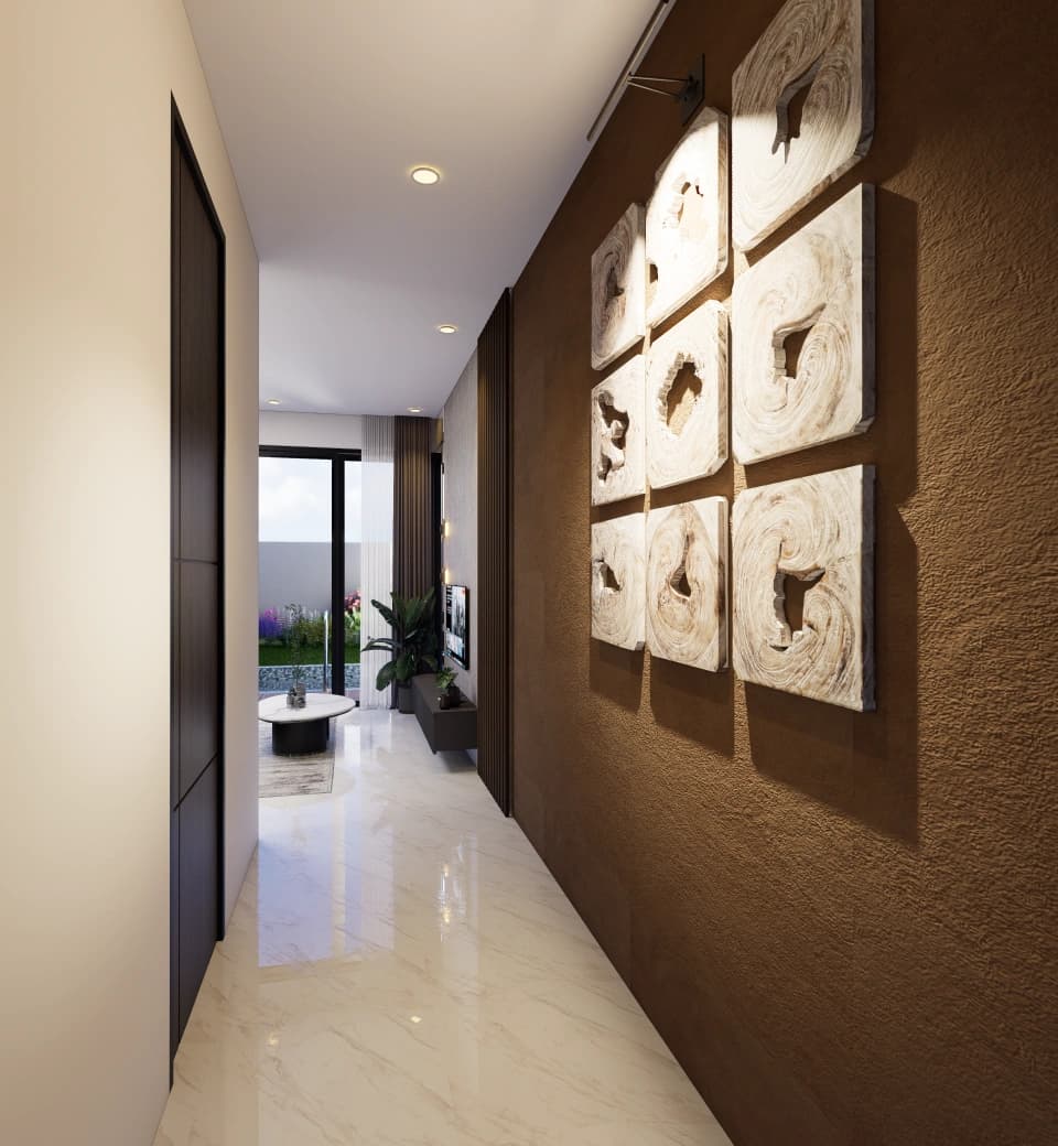 Entrance hall Madava dengan lantai marmer dan pintu tinggi