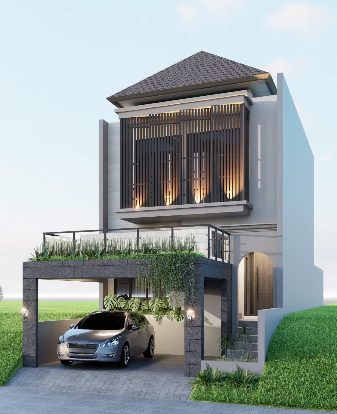 Tampak depan satu unit villa Madava dengan carport dan taman